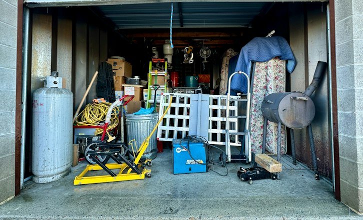 Cluttered garage full of items ready for junk removal